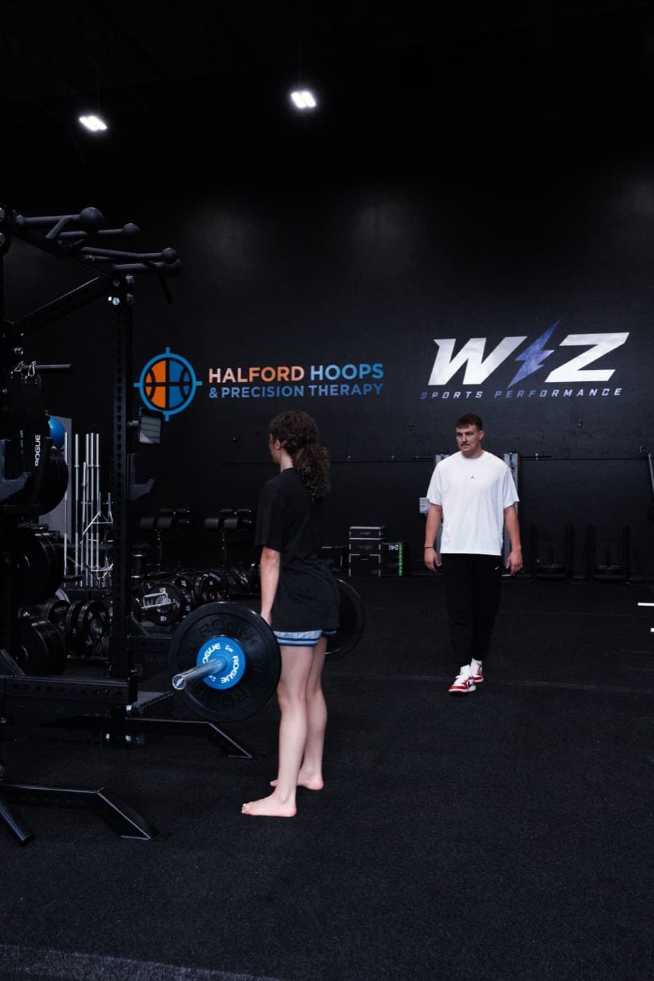 Athlete set up under a loaded barbell